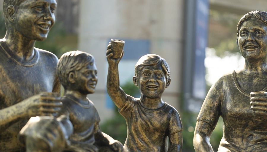 Bronze family sculptures at MAX Estates